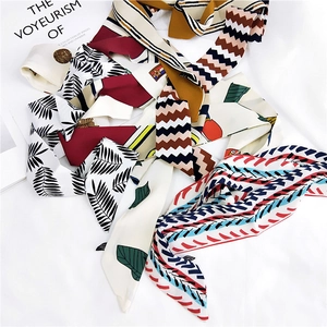 Elegant variety of slim silk scarves with geometric and tropical patterns for women