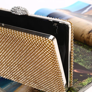 Luxury gold evening clutch bag with handmade rhinestones and crystal clasp
