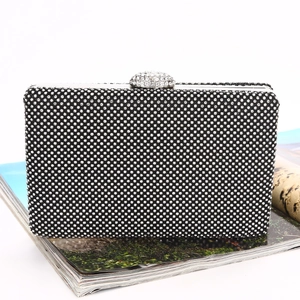Elegant black evening clutch bag with sparkling silver rhinestones and crystal clasp closure
