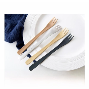 Close-up of 304 stainless steel dessert forks in matte gold, silver, copper, and black