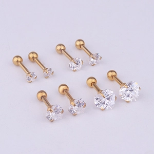 Detailed set of golden heart zircon stud earrings in four sizes with ball screw backs