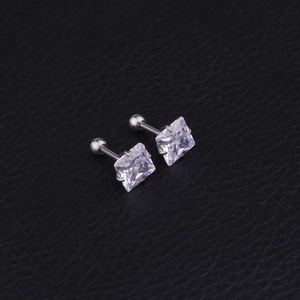 Macro detail of square-cut cubic zirconia stud earrings with screw-back metal post