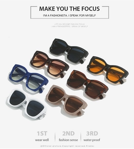 Flat lay of retro Y2K cat eye sunglasses in seven assorted colors and PC frames