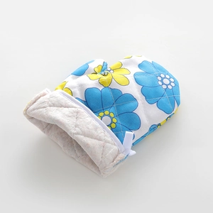 Heat resistant oven mitt with blue and yellow floral patterns for kitchen baking