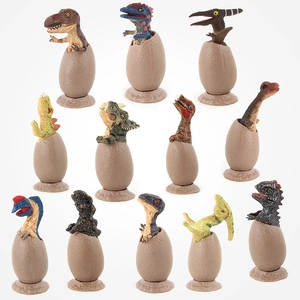 Set of 12 realistic hatching dinosaur egg toy figures with detailed textures on white base