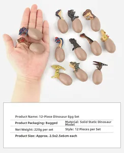Detailed view of 12 solid dinosaur eggs models with sizes shown in hand for scale