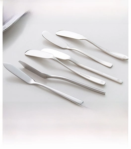 Close-up of premium 304 stainless steel butter knives with mirror finish and various tips