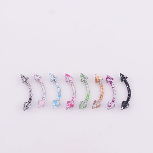 Set of eight stainless steel cone eyebrow rings with colorful speckled painted patterns