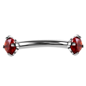 Detail of surgical steel curved barbell with four-prong set deep red round crystals