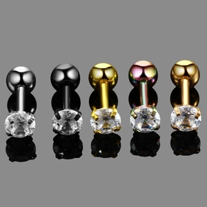 Macro shot of 5-piece set of four-prong barbell ear studs with round clear zircon stones