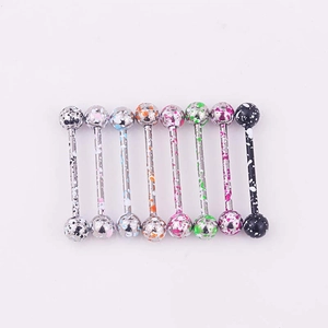 Set of nine colorful splatter paint tongue rings in various vibrant graffiti patterns