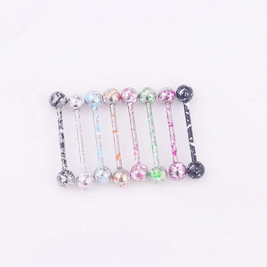 Detailed view of eight colorful speckled enamel barbell piercings made of stainless steel