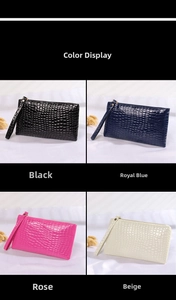 Detail showing crocodile embossed texture and color options of the long wristlet clutch