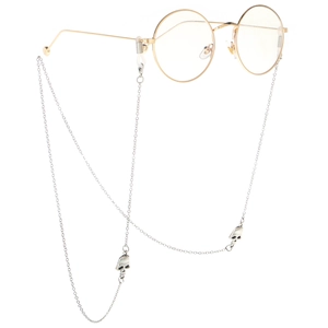 Silver skull chain on round gold glasses frame featuring non-slip rubber loop connectors