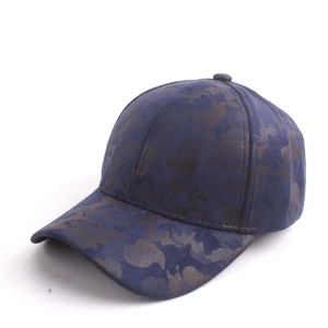 Detail of navy camouflage baseball cap showing canvas texture and 6-panel structure