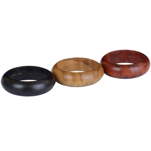 Minimalist wooden rings set in dark sandalwood, natural wood, and mahogany finishes