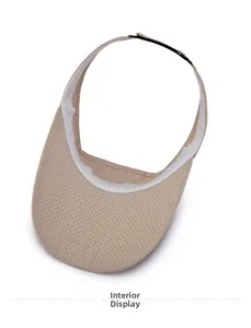 Interior view of beige sun visor showing breathable fabric and white sweatband detail