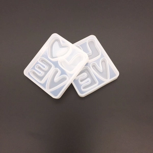 Detailed view of DIY silicone LOVE heart shape molds for high mirror resin craft decorations