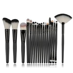 Professional 18-piece makeup brush set with dual-tone bristles and sleek black handles