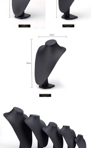 Macro view of matte black leather necklace display busts in various size specifications