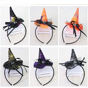 Detail showing various Halloween witch hat headbands with lace and bow decorations