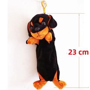 Detail of 23cm plush dachshund dog pencil case with yellow hook on white wall