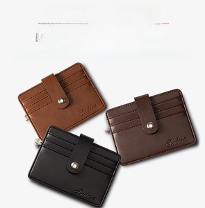 Detail view of multi-slot PU leather card holders with metallic snap and embossed logo
