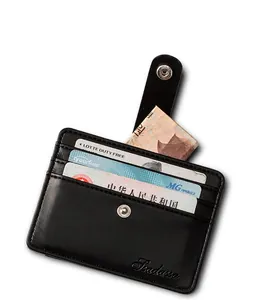 Detail view of the multi-card slots and snap button closure of the black PU leather wallet