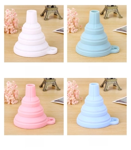 Detailed view of collapsible silicone funnels in four colors with hanging holes