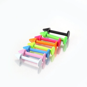 Set of 8 colorful fluorescent stainless steel cone lip rings on reflective white surface