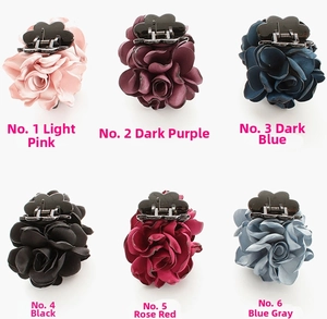 Selection of medium rose fabric flower hair claws in six elegant colors for updos