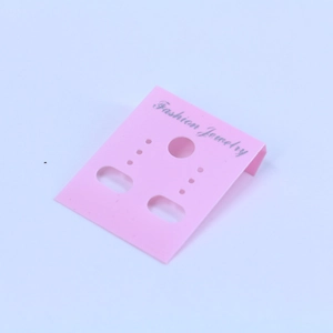 Close-up of pink plastic earring display card with Fashion Jewelry silver foil stamping