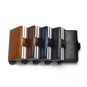 Detailed view of five multi-color PU leather and aluminum automatic pop-up card wallets