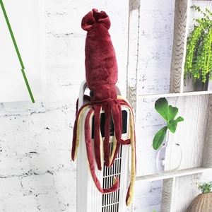 Realistic deep red squid plush toy with cream tentacles on a clean white background