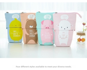 Four different cute animal telescopic canvas pencil cases used as standing pen holders