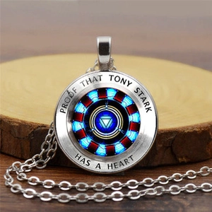 Detailed view of Tony Stark reactor pendant with Proof That Tony Stark Has A Heart engraving