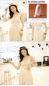Close-up of a white leather skinny belt with a gold square buckle for women's dresses