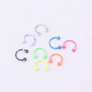 Set of 8 colorful horseshoe septum rings with spotted patterns and ball ends for piercings