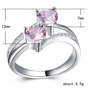 Elegant double heart pink zircon ring in silver finish with white diamond accents