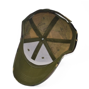 Internal view of camouflage baseball cap showing crown structure and green brim detail