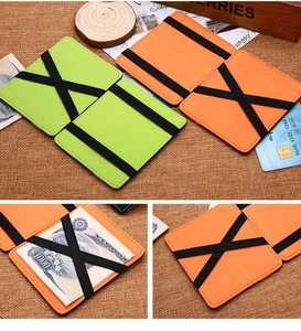 Detail showing orange and green magic wallet with elastic straps and card slots