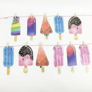 Set of 11 colorful popsicle shaped gift tags with string and wooden clips on white background