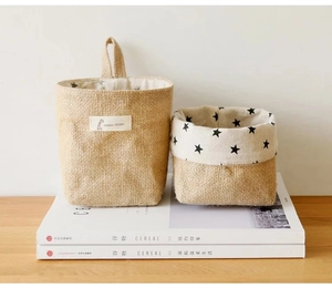 Detailed view of burlap storage baskets with star pattern and Animal Story label