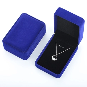 Premium dark blue velvet jewelry box set showing closed lid and open necklace display