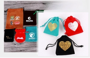 Custom velvet drawstring gift pouches with gold heart foil and diverse brand logos