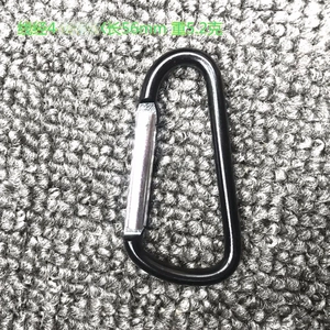 Detail view of a grey D-shaped carabiner showing 56mm length and 4.3mm wire diameter