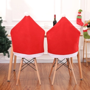 Set of 2 red Santa hat chair covers for Christmas holiday dining room decoration