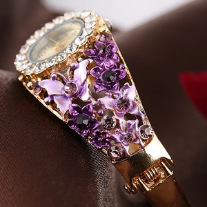 Elegant gold flower bracelet watch with purple enamel butterfly and sparkling rhinestones