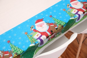 Detailed Christmas tablecloth with Santa and reindeer pattern on blue waterproof plastic