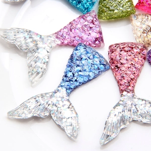 Colorful resin mermaid tail charms with shimmering scales for DIY crafts and decor